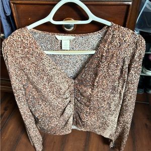 H&M leopard skin blouse . Beautiful blouse very light